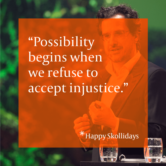 Peter Drobac with a background of greenery, speaking on stage. The image has an orange overlay with the words: "Possibility begins when we refuse to accept injustice"