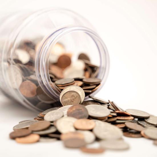 Spilled jar of coins (illustrative)