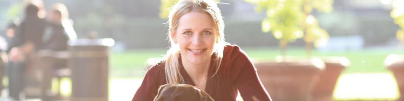 Rikke Rusenlund, founder of Borrow My Doggy with her dog