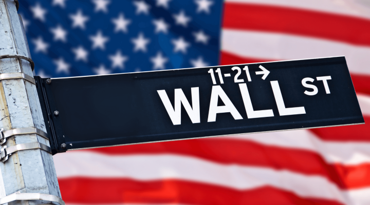 Wall Street sign and an American Flag
