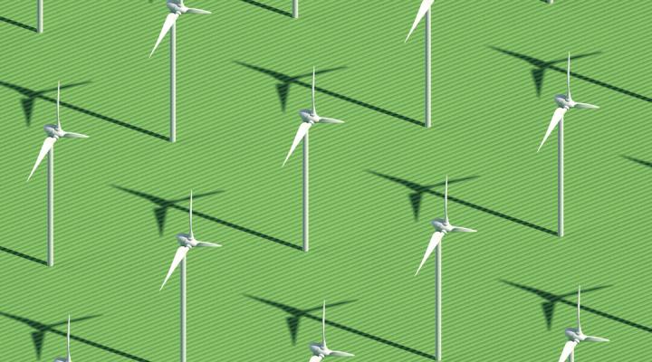 A cluster of windmills in a windmill farm providing green energy. 